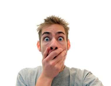 Shocked man holding his hand up to his mouth in disbelief. clipart