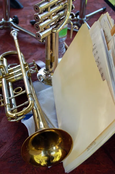 Trumpets Folder Sheet Music Red Floor — Stock Photo, Image