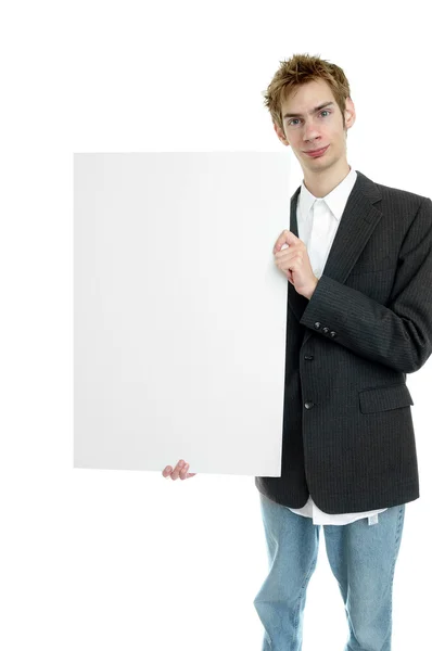 Jovem Empresário Segurando Sinal Papelão Branco Com Copyspace Enquanto Levanta — Fotografia de Stock
