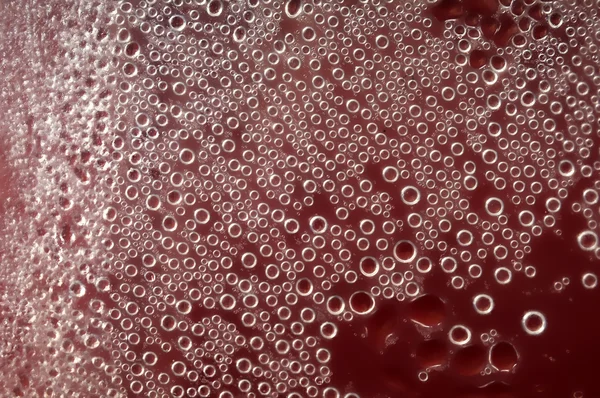 Bolhas de água de condensação vermelha — Fotografia de Stock