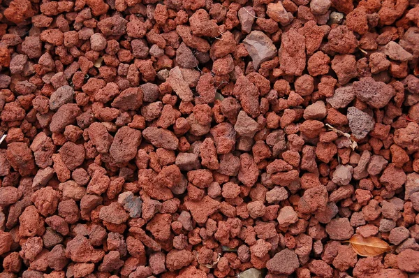 Красный вулканический камень — стоковое фото