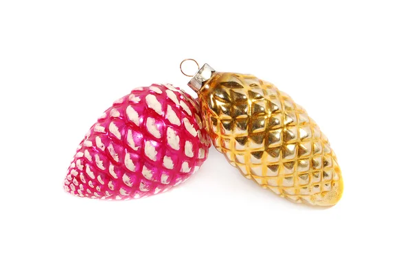 Ornamente aus rosa und gelben Tannenzapfen — Stockfoto