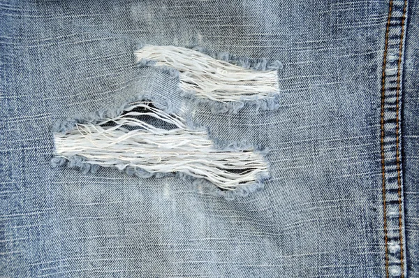 Worn out blue jeans close up — Stock Photo, Image