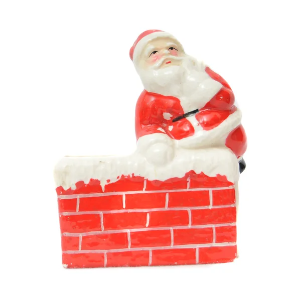 Санта Клаус отдыхает на дымоходе — стоковое фото