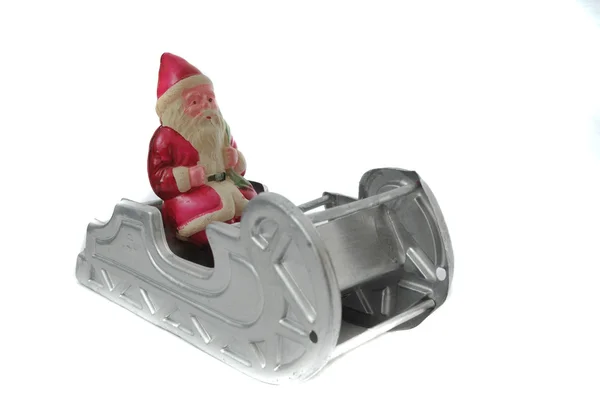 Figura Miniatura Isolata Sfondo Bianco Babbo Natale Cavalcando Sua Slitta — Foto Stock