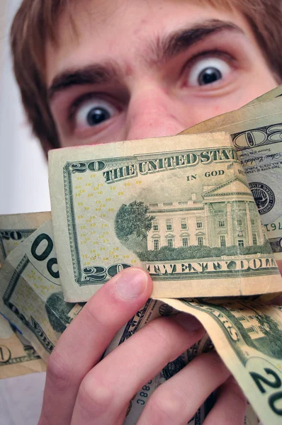 Homem Desfocado Fundo Olhando Para Maço Dinheiro Com Uma Coloração — Fotografia de Stock