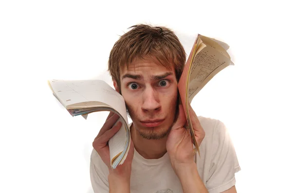 Student holding blank lined paper to face — Stock Photo, Image