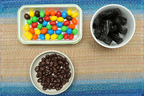 Selection Chocolate Colorful Beans Black Australian Licorice Chocolate Covered Raisins — Stock Photo, Image