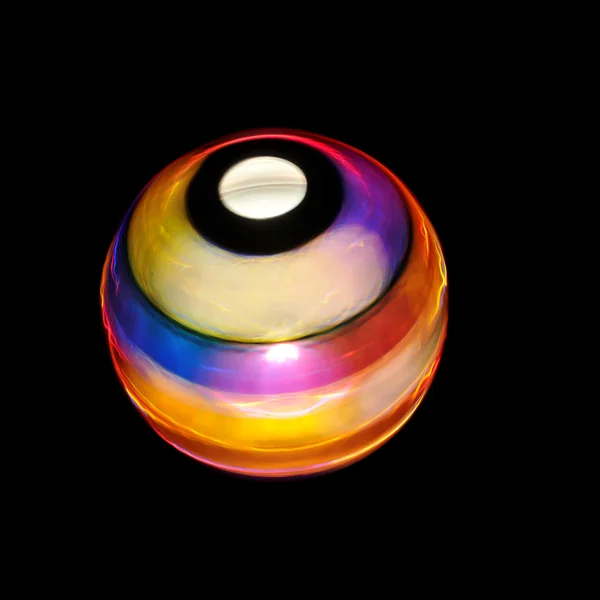 Une Sphère Vibrante Colorée Isolée Sur Fond Noir — Photo