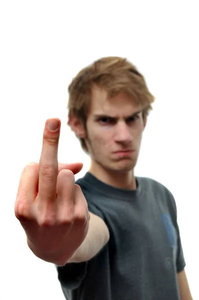Angry teen flipping off the middle finger bird gesture — Stock Photo, Image