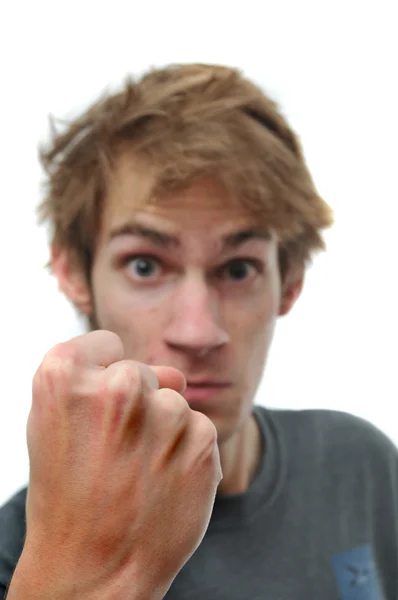 Young Adult Teenage Man Threatens His Clenched Fist Hand Selectively — Stock Photo, Image