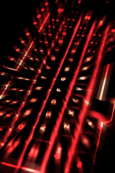 Красная иллюминированная клавиатура — стоковое фото