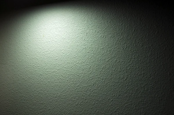 Spotlight Shines Painted Textured Wall Has Slight Green Tone — Stok fotoğraf
