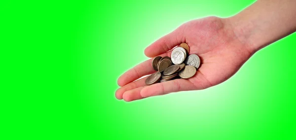 Hand holding pile of coins — Stock Photo, Image
