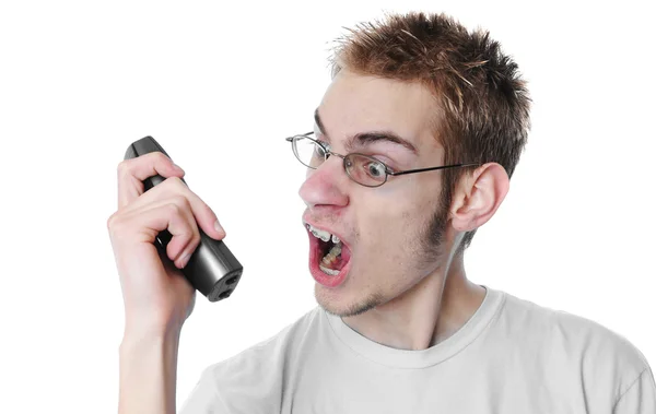 Jeune homme en colère crie dans le téléphone — Photo