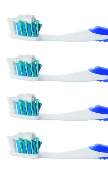 Geïsoleerde tandenborstel met plakken — Stockfoto