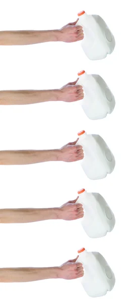 Arm Hand Houden Kunststof Melkpakken Kruik Geïsoleerd Een Witte Achtergrond — Stockfoto