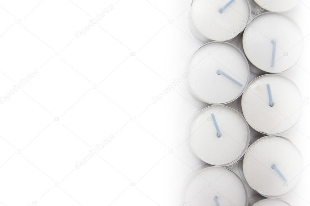Tealights candles background isolated on white
