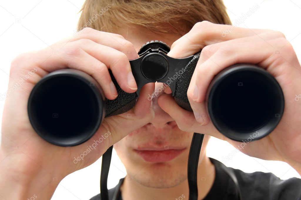 Man searching with black binoculars isolated on white background