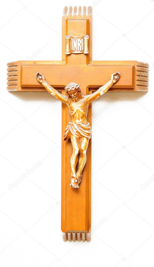A wooden crucifix with the lettering INRI carved at the top isolated on white background
