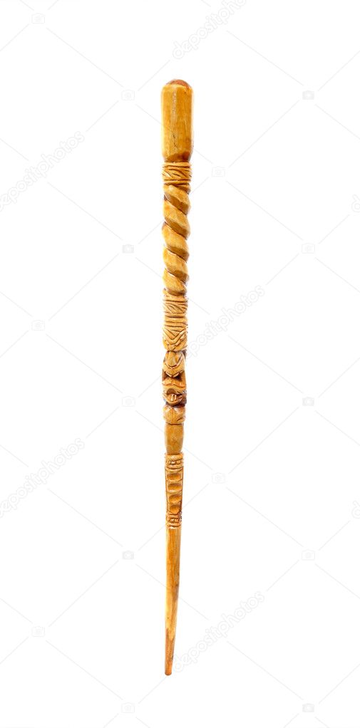Fancy wooden cane with carved designs on it isolated on white background