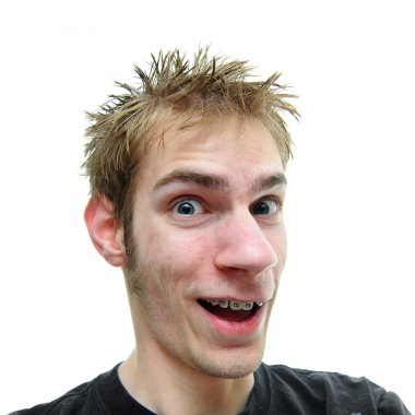 An average looking young adult smiles and grins at the camera. He has braces and green eyes with spiky hair clipart