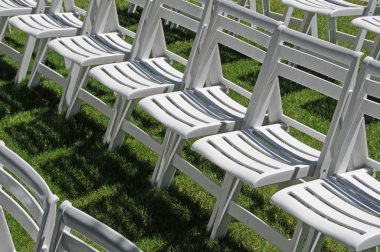 Lawn chairs on grass clipart