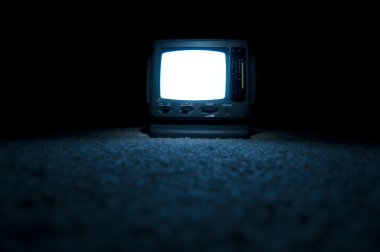 TV Screen on at night clipart