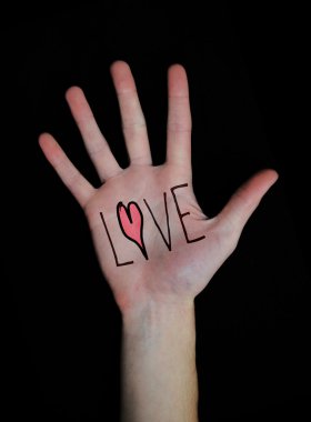 Love written on Hand clipart