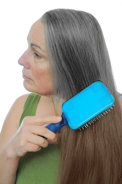 Woman Combs Her Hair Gray Brown Showing Signs Old Age — Stock Photo, Image