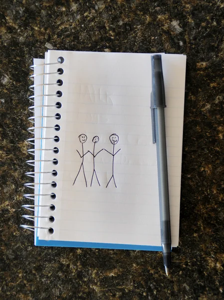 Stick Figure Drawing Three Holding Hands Notepad — Stock Photo, Image