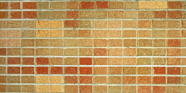 Eine Mehrfarbige Mauerstruktur Aus Roten Braunen Und Braunen Ziegeln — Stockfoto