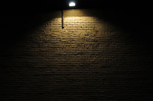 Brick wall with spotlight — Stock Photo, Image