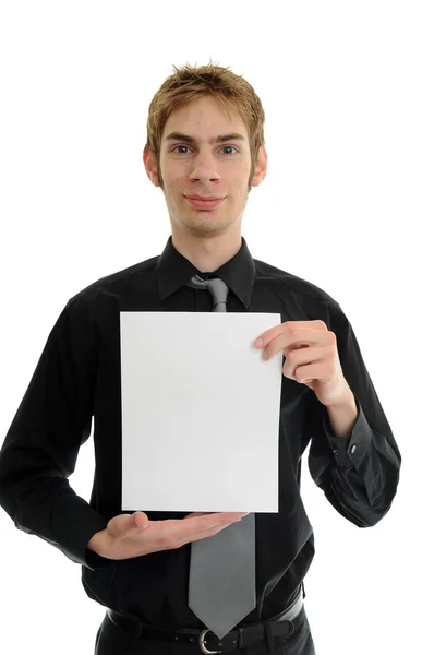 Молодой человек держит чистую бумагу — стоковое фото