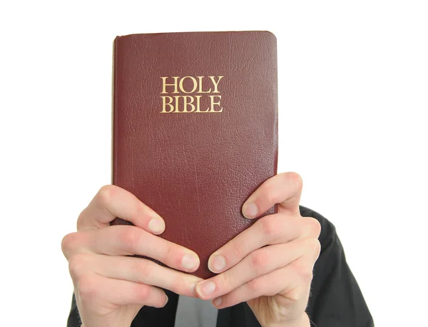 Person Hält Die Heilige Bibel Vor Ihr Gesicht — Stockfoto