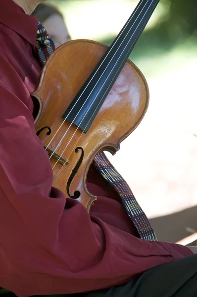 Small Violin Tucked Away Man Red Shirt — Stock Photo, Image