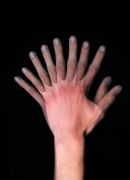 Abstrakte Mehrfachbelichtung Einer Weißen Kaukasischen Hand Isoliert Auf Schwarzem Hintergrund — Stockfoto