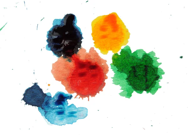 Abstract closeup photograph of colorful ink and paint splotches, splatters, dabs, dribbles, and splatters isolated on a white background.
