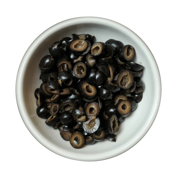 Schwarze Oliven in Schüssel schneiden — Stockfoto