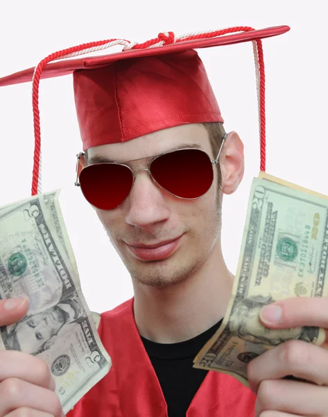 Graduado mostrando dinero — Foto de Stock
