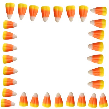 Halloween candy corn arranged in a border isolated on white background clipart