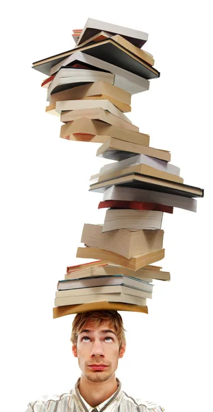 Balancing een stapel boeken op hoofd — Stockfoto