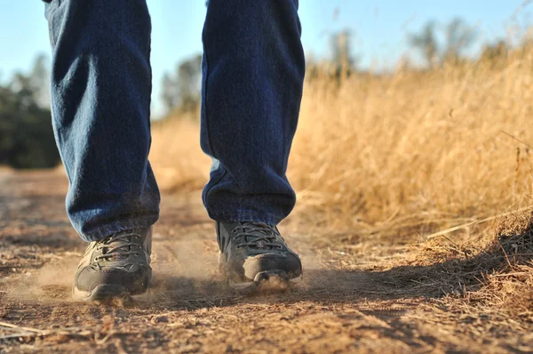 Person Stomps Dirt Causing Dust Appear — Stock Photo, Image