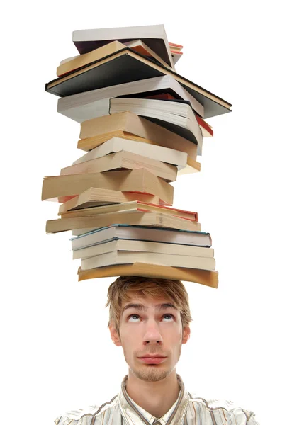 Bilanciamento pila di libri sulla testa — Foto Stock