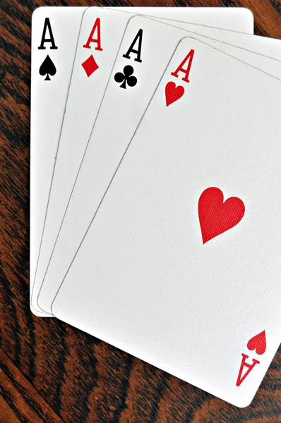 Group Four Playing Card Aces Stained Oak Wooden Table — Stock Photo, Image