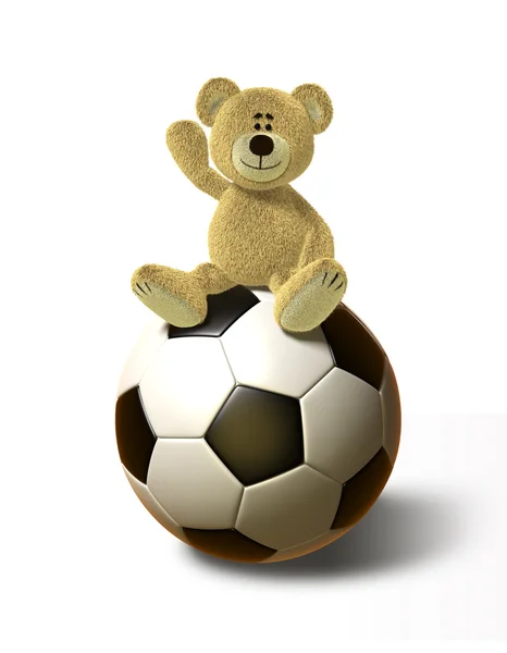 Teddy Bear sits on a big Soccer Ball — Stock Photo, Image