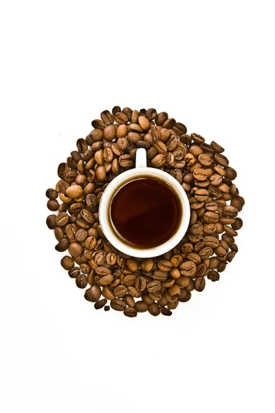 Чашка кофе и зерно кофе — стоковое фото