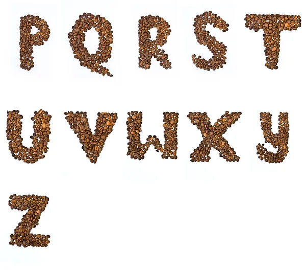 Γράμματα του αλφαβήτου με τον καφέ σε κόκκους Εικόνα Αρχείου