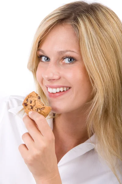 Junge Frau Isst Einen Keks — Stock fotografie