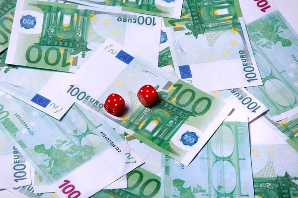Money with dice — Stock Photo, Image